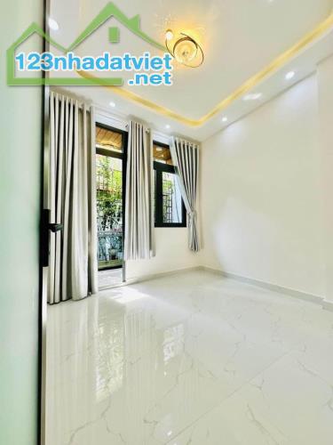 Nhà 2 lầu, 4 phòng ngủ, sân thượng, hẻm xe hơi 2/, đường Liên Khu 5-6, giá 2 tỷ58 - 2