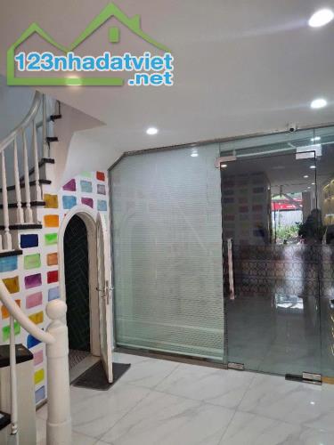 Bán nhà mặt phố Xã Đàn, Q Đống Đa,thang máy, vỉa hè KD, cho thuê 80tr, 95m, Mt 6m, 48.5 tỷ - 2