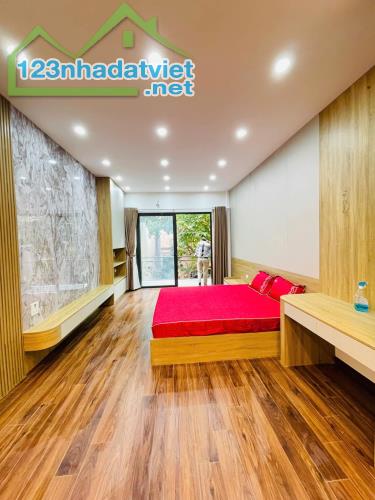 NHÀ PHÙNG CHÍ KIÊN 50M2 x 6 TẦNG Ô TÔ NGỦ TRONG NHÀ - 15.7 TỶ - 2