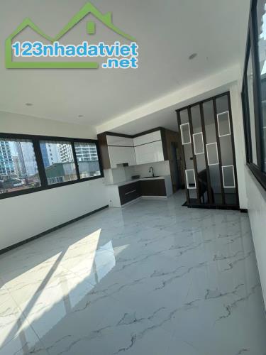 Bán nhà mặt phố Âu Cơ bên số lẻ, DT 128m, 7 tầng mới, thang máy, MT 5.7m, giá 51.5 tỷ. - 4