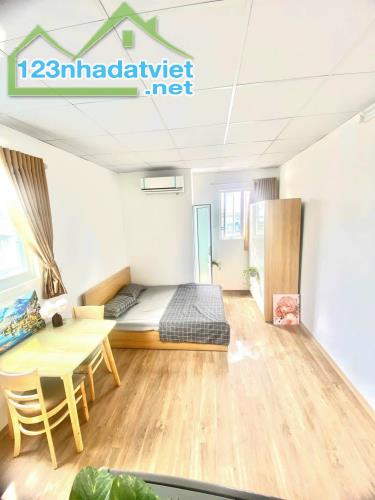 BÁN TÒA CHUNG CƯ MINI THÁI THỊNH 50M2*7T, DÒNG TIỀN 75TR/TH, CÁCH Ô TÔ 20M - 1