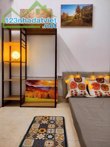 Mua đất tặng nhà 4 tầng - Hoàng Cầu - Tặng GPXD 7 tầng cho khách 57m 4 tầng 9mt, giá10.2tỷ - 1