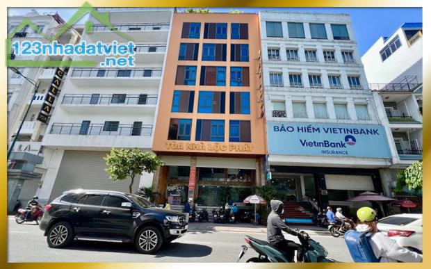 Cho thuê văn phòng mặt tiền Bạch đằng sát sân bay, văn phòng ốp kính thoáng đã, hầm xe - 3