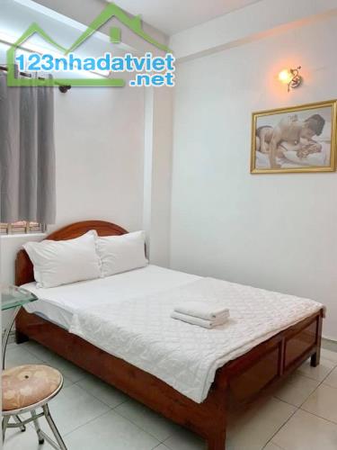 Bán Khách Sạn Mặt tiền, 6 tầng 13 phòng thu nhập hơn 100tr/tháng, SHR, giá chào 14tỷ490 TL