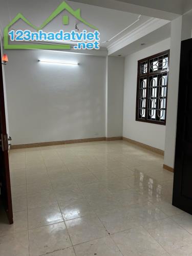 Cho thuê nhà phân lô KĐT Định Công, 75m2 x 4.5 tầng, VP cty, ôtô tránh - 2