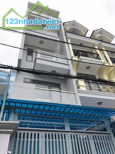 Nhà Dương Quảng Hàm, P.5, GV. DT: 4m x 28m trệt 3 lầu, giá 10,9ty TL