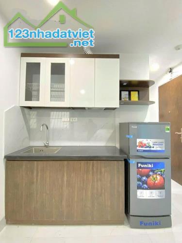 An Dương Vương dt 117m2 nhà 8 tầng gần 8m mặt tiền giá 24.5 Tỷ Tây Hồ - 1