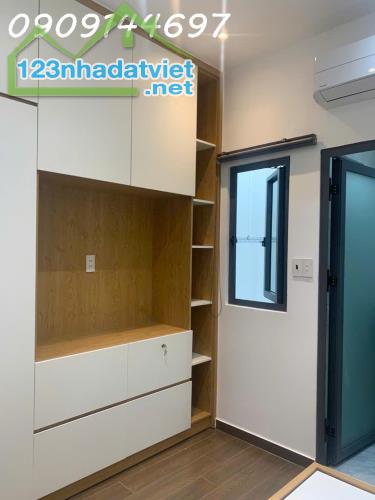 Nhà 2 tầng đường LÊ VĂN KHƯƠNG, phường HIỆP THÀNH, Q12, dt 48m2 (4mx13m) Hẻm Ôtô Giá - 1