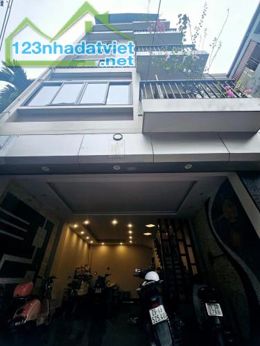 Bán nhà mặt phố Phương Mai, Đống Đa. 115 m2 x 7T x MT 7,2 m. Ô tô kinh doanh văn phòng.
