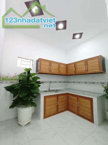 Nhà đẹp 1 trệt 1 lầu tại hóc môn giá chỉ 620tr - sổ hồng riêng - 2