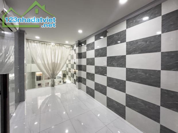 Bán nhà CMT8 quận 3 DT 30m2 ,6 tầng BTCT nhỉnh 4ty - 2