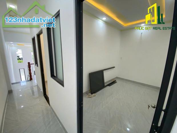 Nhà 1trệt 1lửng 90m2, SHR thổ cư, đường ô tô né thông, gần trường THCS Tân An- P. Hóa An - 2