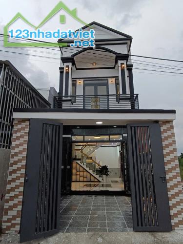 Nhà mới SHR 82m2 mặt tiền nhựa 7m sân xe 7 chỗ gần chợ Tân Phước Khánh, Giá chỉ 2,55 tỷ TL - 1