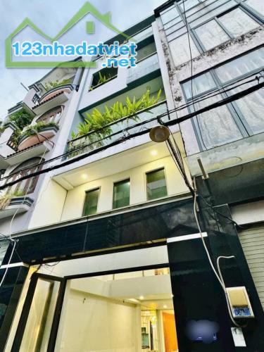 Nhà mới 5 tầng Thống Nhất P16 Gò Vấp Hxh thông 4x14m Giá 8.1Tỷ