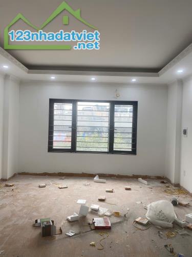 Bán nhà Ngõ Tân Lạc. 37m2-5tang thang máy, sau nhà mặt phố. - 2