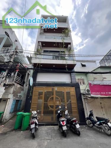 Bán tòa nhà 6 tầng 2 mặt tiền trước sau đường Trường Sa Quận 3 chỉ 30 tỷ - 4
