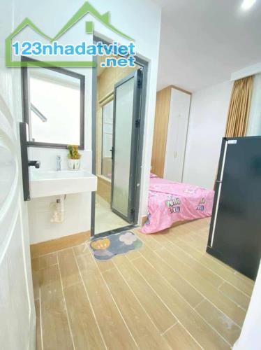 CẠNH CV LÀNG HOA - 17 CHDV 6 TẦNG 164m2 - DÒNG TIỀN 70-80TR/THÁNG - 30 TỶ - 4