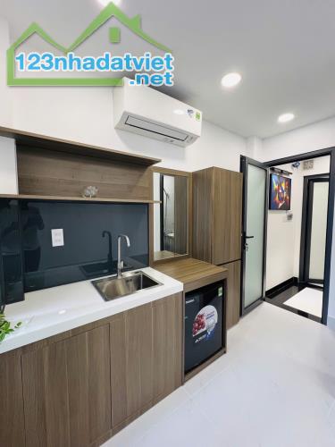 NHÀ MỚI ĐẸP NGAY TRUNG TÂM PHÚ NHUẬN - HẺM XE HƠI - 5 TẦNG - 45M2 6PN