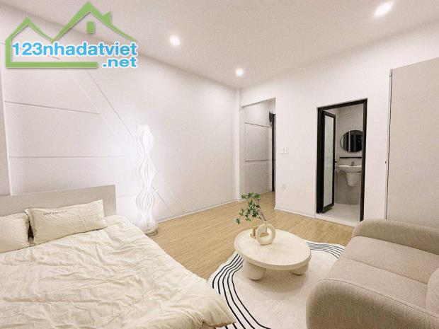 Bán tòa căn hộ dịch vụ Tây Sơn-Thái Thịnh, 51m2 x 5T, 11 phòng đủ nội thất. Giá 9,8 tỷ - 2