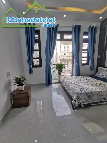 B.ÁN NHÀ KHU PHÂN LÔ, HẺM 8M, 4 TẦNG BTCT, XE 7 CHỖ NGỦ TRONG NHÀ, 6.5X12.5M, 4TY950. HT13 - 1