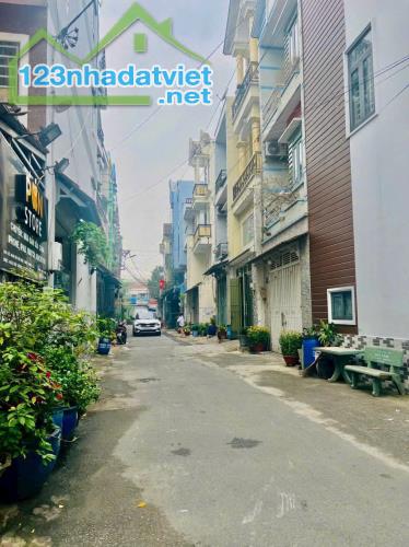 bán căn nhà shr hẻm nhựa 7m thông 1/ ht13 Phường hiệp thành q12 - 2