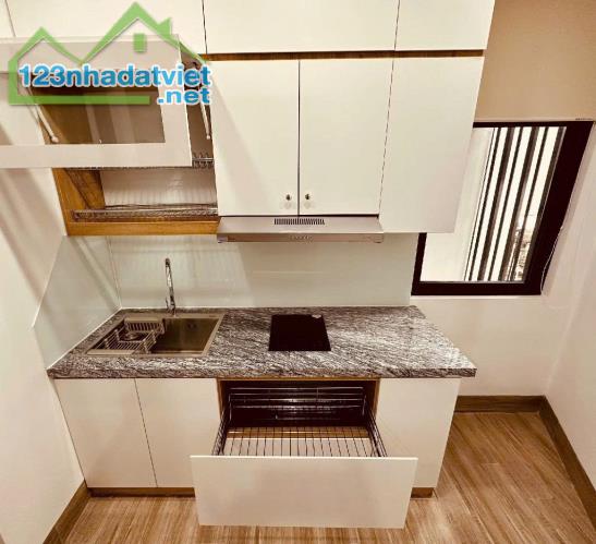 BÁN NHÀ ĐỐNG ĐA - 7 TẦNG THANG MÁY - LÔ GÓC 70m - 15,5 tỷ - 4