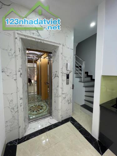 NHÀ ĐẸP KHƯƠNG HẠ, 7 TẦNG THANG MÁY, NGÕ NÔNG, 20M RA Ô TÔ GIÁ 9,3 TỶ - 2
