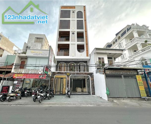 Bán tòa nhà Văn Phòng Trịnh Văn Bô, ~100m2x7T, phân lô ôtô tránh, vỉa hè,3 mặt tiền, có