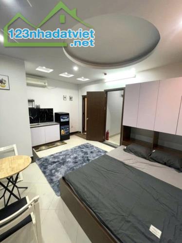 BÁN NHÀ TRẦN ĐĂNG NINH 8T, THANG MÁY 65M2. MT5.5M DÒNG TIỀN 70TR/THÁNG HƠN 21 TỶ - 2