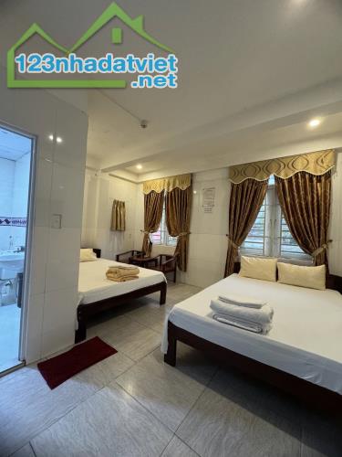 BÁN NHÀ NGHỈ 4 TẦNG - SÁT NGUYỄN TẤT THÀNH - HOÀ MINH - DÒNG TIỀN 50TR/THÁNG - CHỈ 5,X TỶ - 1