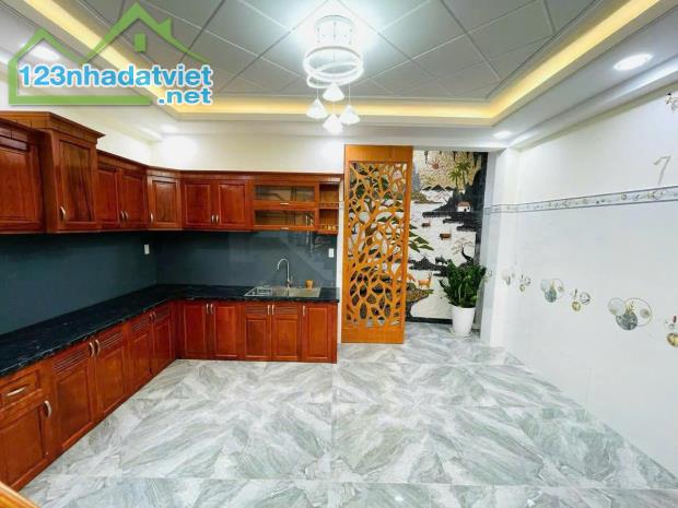 BÁN NHÀ 4 TẦNG TÂN CHÁNH HIỆP 03- GẦN HIỆP THÀNH CITY - HẼM 6M OTO ĐỖ CỬA - NGANG 5M NỞ - 2