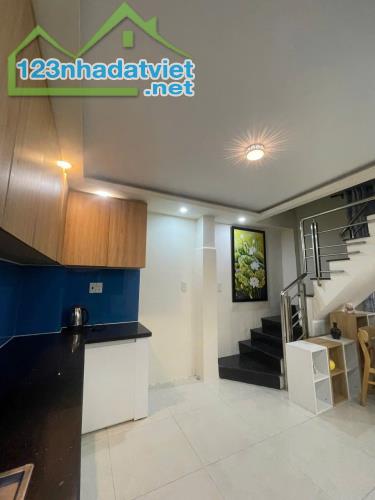 Bán nhà Q12 dt 5x 30 có 13 phòng cho thuê 24tr/tháng giá 5ty95 tl - 2
