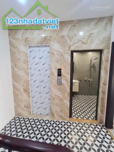 Nhà VIP cách 1 nhà ra phố Nguyễn Khang 7 tầng 56m2 thang máy, ô tô đỗ cửa, cho thuê KD tốt - 3