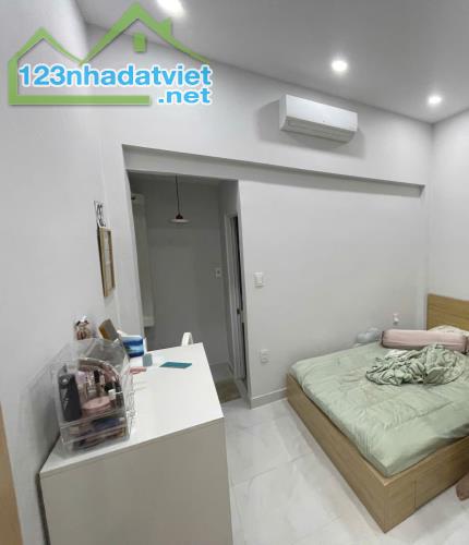 Bán nhà MỚI, SÁT ĐƯỜNG LỚN 34M2, GIÁP KHU HIMLAM KIỀU ĐÀM, Trần Xuân Soạn, Quận 7.