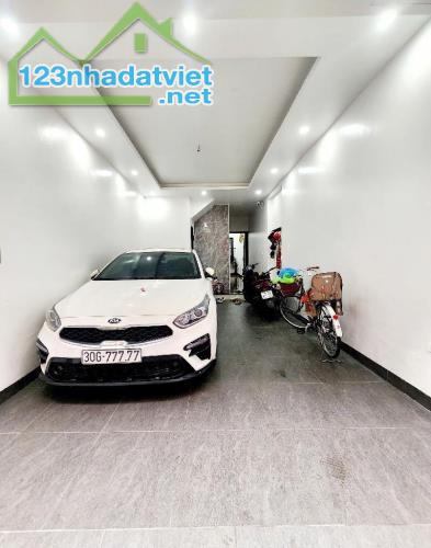 NHÀ ĐẸP KIM NGƯU - PHÂN LÔ - Ô TÔ ĐỖ CỬA - GARA 7 CHỖ VÀO NHÀ - 5 TẦNG - THANG MÁY - 18.X - 1