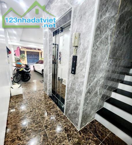 NHÀ ĐẸP KIM NGƯU - PHÂN LÔ - Ô TÔ ĐỖ CỬA - GARA 7 CHỖ VÀO NHÀ - 5 TẦNG - THANG MÁY - 18.X - 3