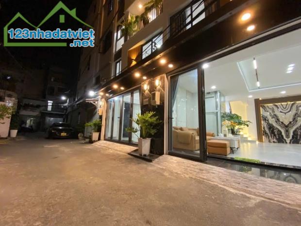 Bán nhà Đẹp Lạc Long Quân - 56m2 x 7T Thang máy Gara Oto - Vài bước ra phố - hướng TN