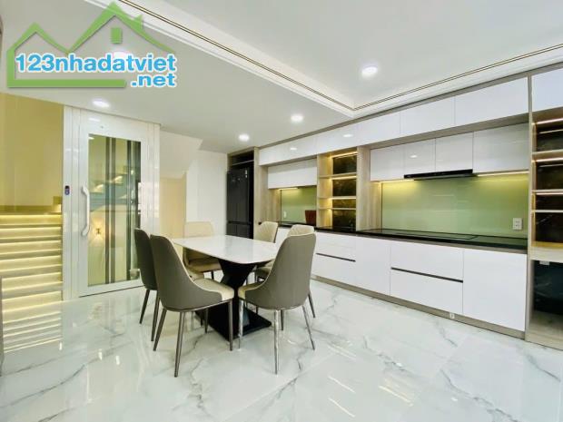 Bán nhà Đẹp Lạc Long Quân - 56m2 x 7T Thang máy Gara Oto - Vài bước ra phố - hướng TN - 3