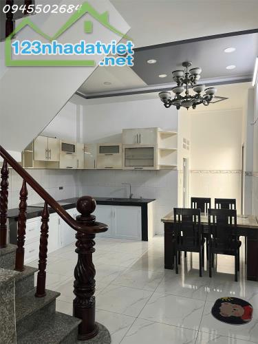 Cho thuê nhà mới gần chợ 7*15m, 1 trệt 1 lầu 4 pn,Thạnh Lộc 13 Q.12 - 2
