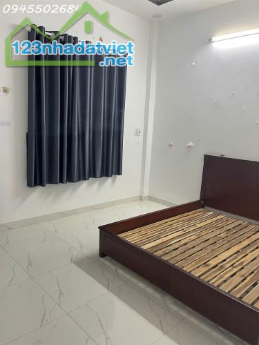Cho thuê nhà mới gần chợ 7*15m, 1 trệt 1 lầu 4 pn,Thạnh Lộc 13 Q.12 - 1