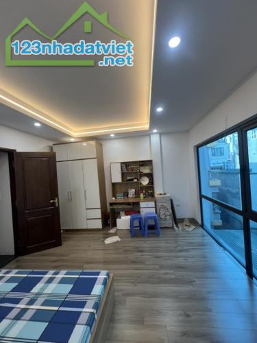 Phố Thái Thịnh, Đống Đa. Oto đỗ cửa, kinh doanh. Nhà 5 tầng x 32m, giá 6.4 tỷ - 2