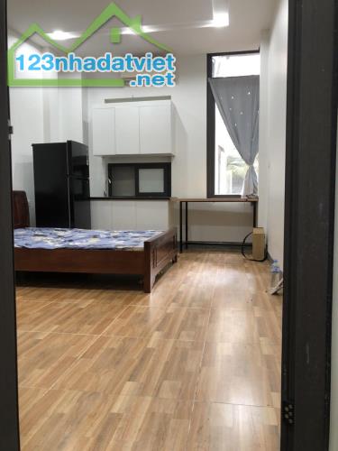 Bán nhà mặt phố Hào Nam giao thông thuận lợi  Vừa ở vừa Kinh doanh DT 56m 5 Tầng Giá 37,5 - 2