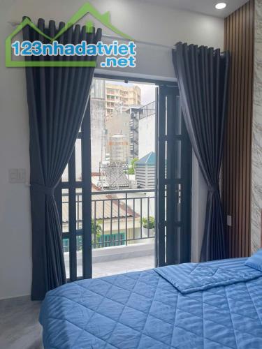 Bán nhà 2 lầu BTCT hẻm 965 Quang Trung .P14. GV. Giá 3 tỷ 1 - 2