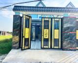 Bán căn nhà 1 trệt 1 lầu mới xây, SHR,  nằm đối diện cổng KDC Tân Đức, DTSD 150m2, 1ty399
