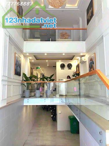 Bán khách sạn hầm 6 tầng - Khu Phan Xích Long, Phú Nhuận - 4
