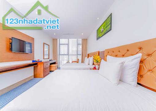 BÁN GẤP K.SẠN LÔ GÓC 2 MT sát LÊ QUANG ĐẠO, NGŨ HÀNH SƠN 200M2, 12 TẦNG, 1 HẦM, HỒ BƠI,BAR - 1