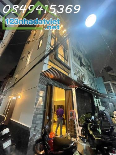 Nhà  Căn Góc 3 MT HXH Trường Sa trung tâm quận 3,- 5 tầng 36m2 sổ vuông Hoàn Công đủ - 1