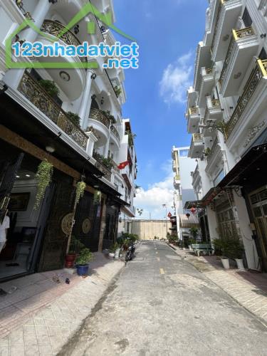 Gấp Bán nhà gần chợ Bình Thành hẻm nhựa 7m xe hơi vào nhà 60m2-4 Tầng Nhỉnh 5tỷ