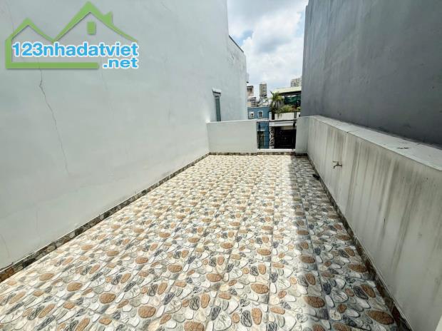 Bán nhà HXH p1 Quận GV. - DT 3m x 17m nở hậu 3m6,trệt 2 lầu - 5