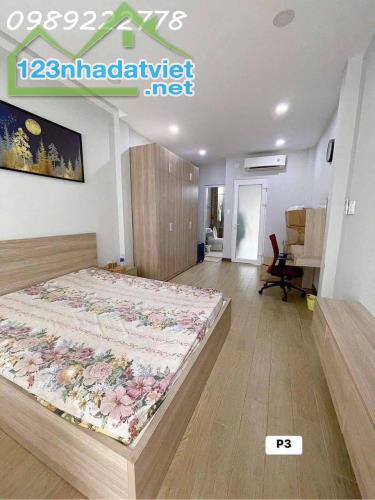 SÁT MẶT TIỀN ĐƯỜNG NGUYỄN TRÃI - XE HƠI ĐỖ CỬA - 4 TẦNG - KHU VỰC AN NINH DÂN TRÍ. - 2